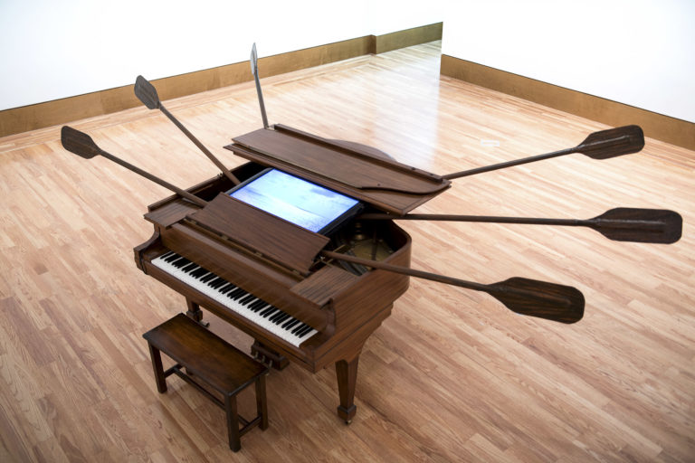 Escape. 2013. Installation with piano wooden, oars and video monitor. Dimensions variable. The Paricia & Philip Frost Museum. Miami, Fl.